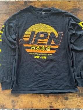 Fashion Nova Black Long-Sleeve Graphic Tee with Yellow and Orange Print